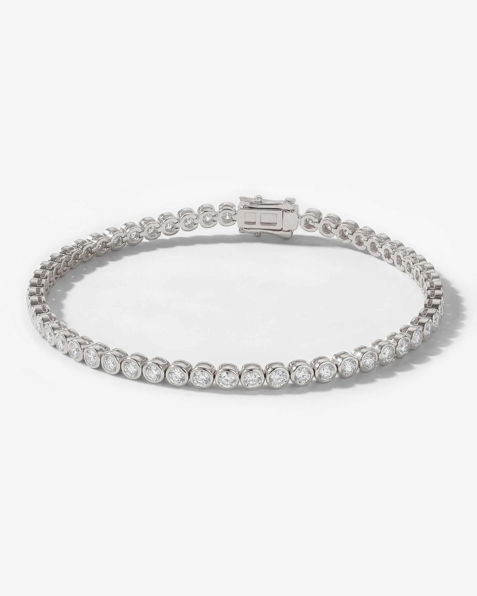 DIAMOND TENNIS BRACELET (BEZEL SET IN WHITE GOLD)